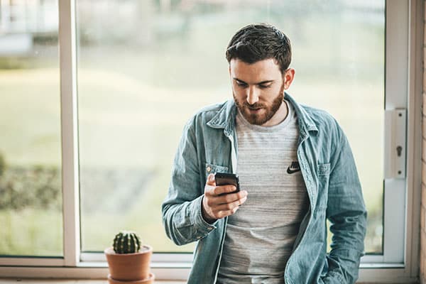 Man on phone calling for drug test NDS