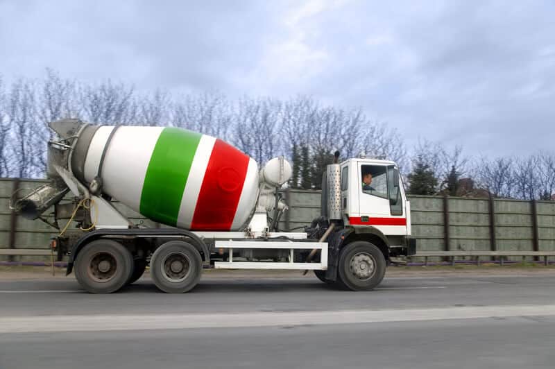 Cement truck driving on the highway